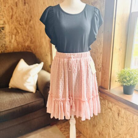 Black shirt/pink skirt