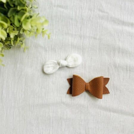 White/leather bows
