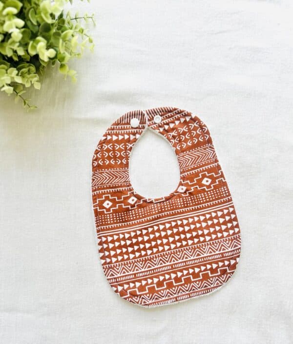 Boho/burnt orange bib