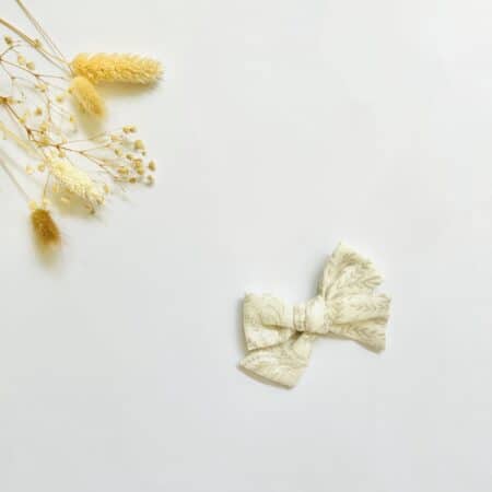 Cream/ tan floral pinwheel bow
