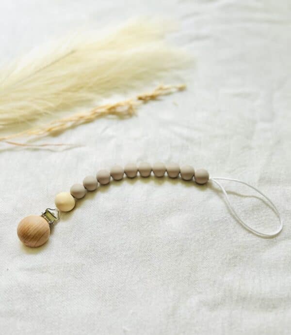Gray wooden Paci clip