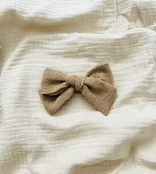 Light brown pinwheel bow