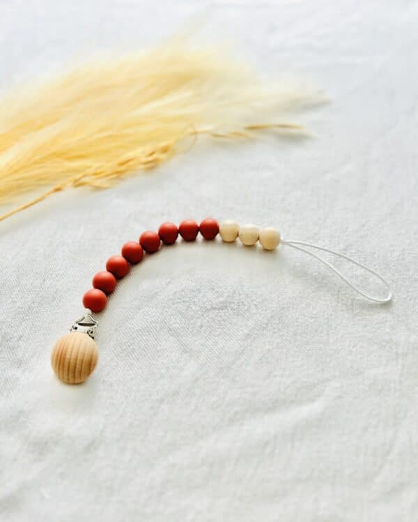 Burnt orange wooden Paci clip