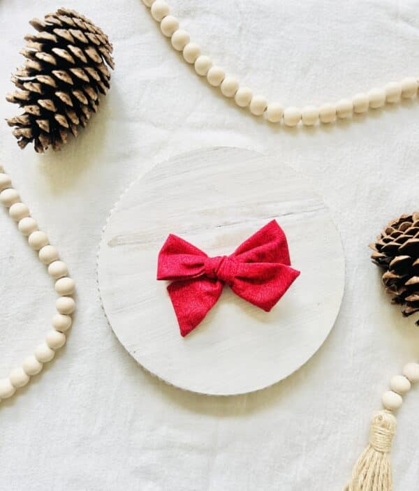 Red floral pinwheel bow