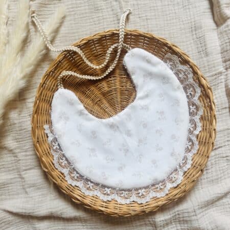 White floral round tie bib